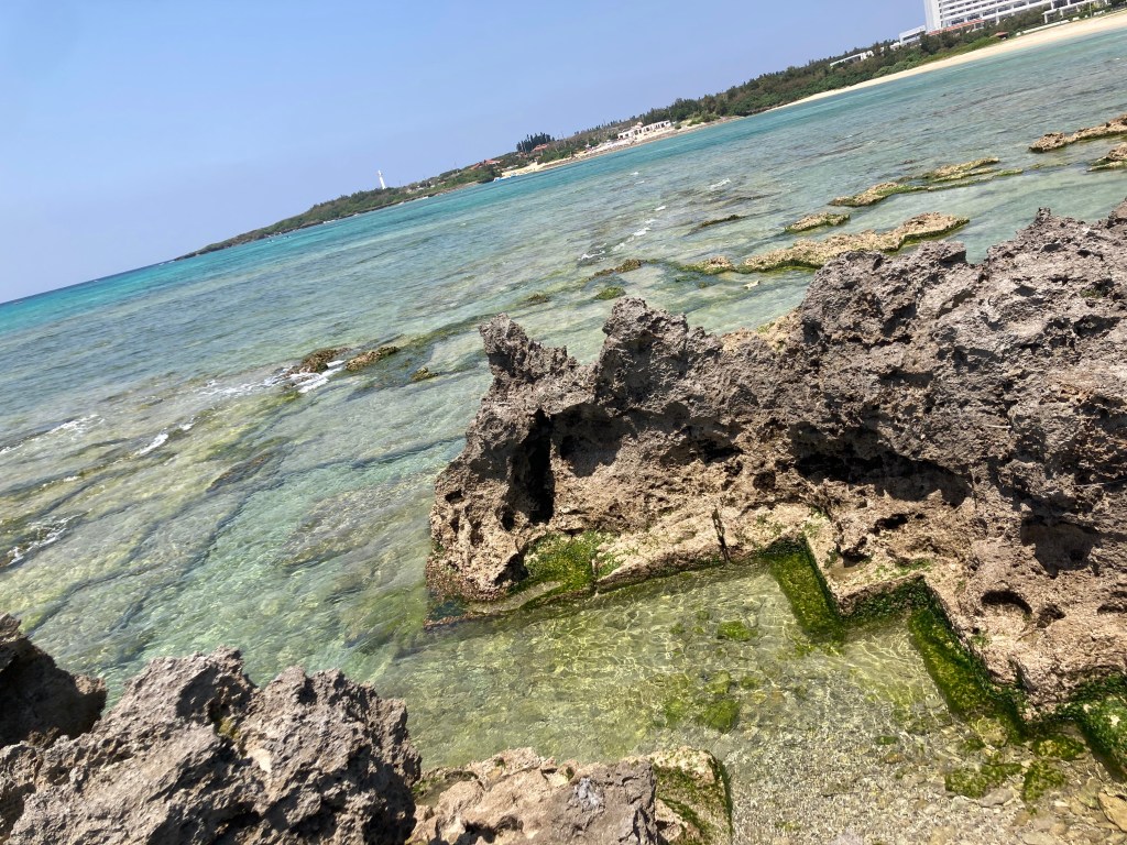 uza beach strange square cuts in the rock